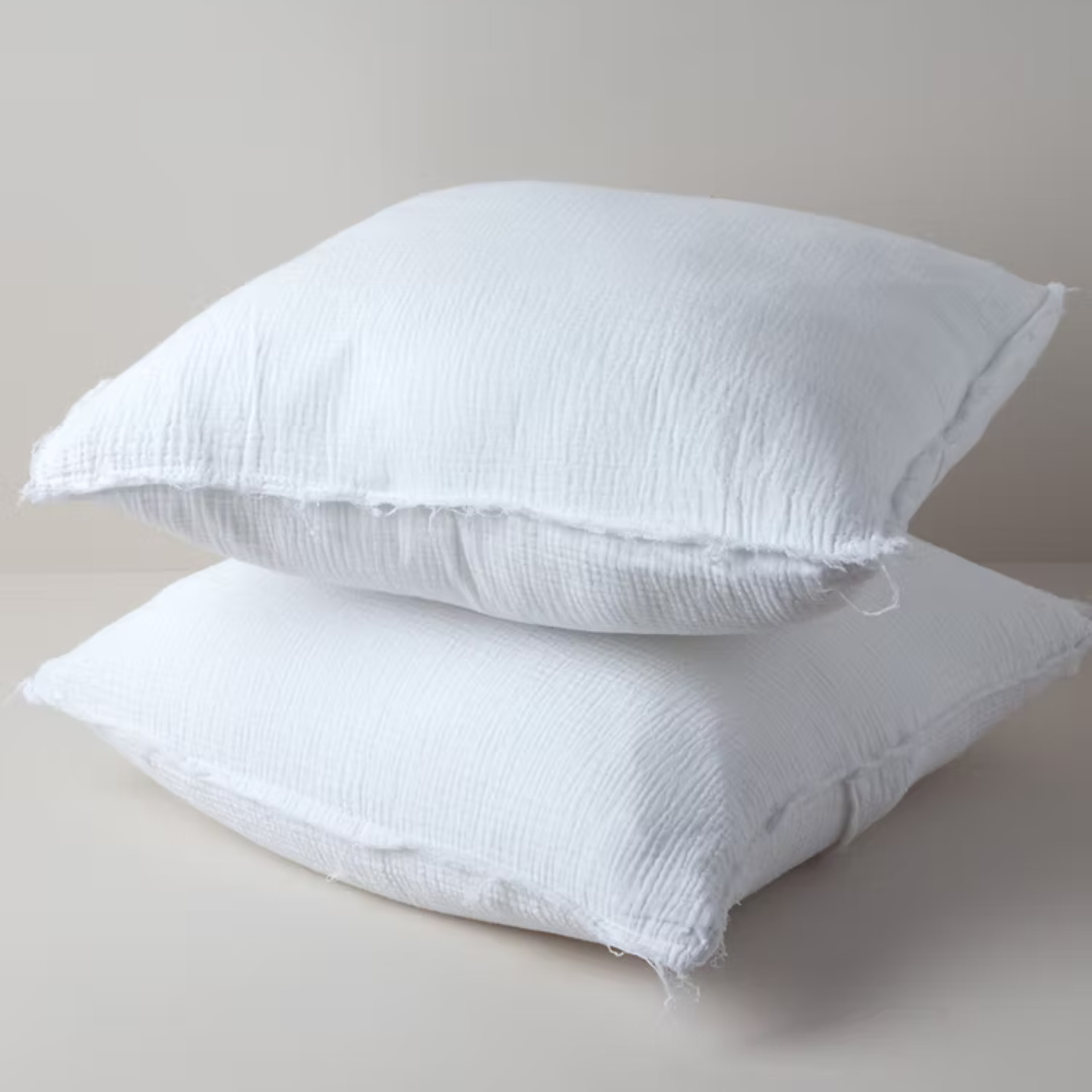 זוג כריות נוי איכותיות עם ציפית מ-100% כותנה אורגנית במרקם טטרה.