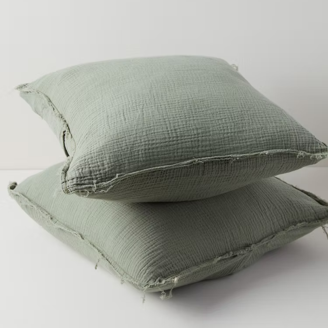 זוג כריות נוי איכותיות עם ציפית מ-100% כותנה אורגנית במרקם טטרה.